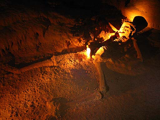 The calcified remains of a woman sacrificed over 1000 years ago by the Mayans. Her son's remains were a few steps away from her .jpg