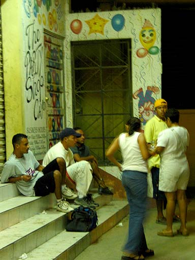 A group of local teens hanging out in from of the San Ignacio post office.jpg