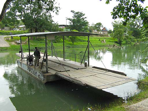 Hand operated ferry connecting  Xunantunich to the local roads.jpg