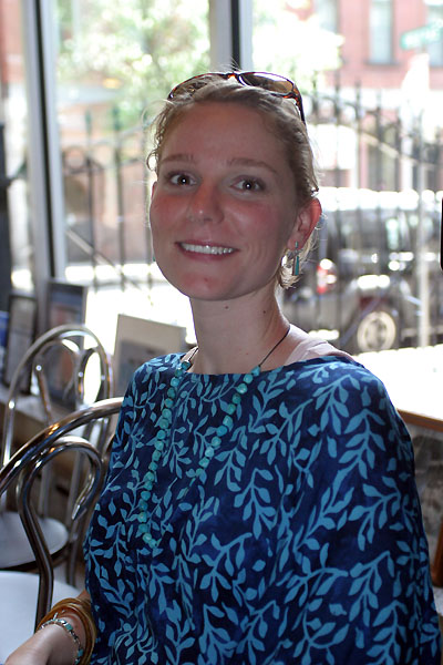 Hilary is all smiles when she spots the waitress with her gelato.