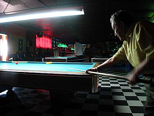 Old man playing billiards.jpg