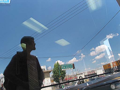 Pete's shadow in a storefront window.jpg