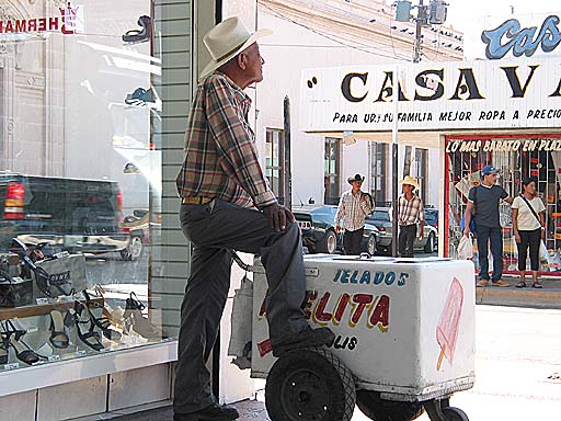 These Mexican coyboys are all over the center of town selling ice cream.jpg